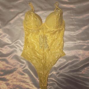 FN yellow bodysuit